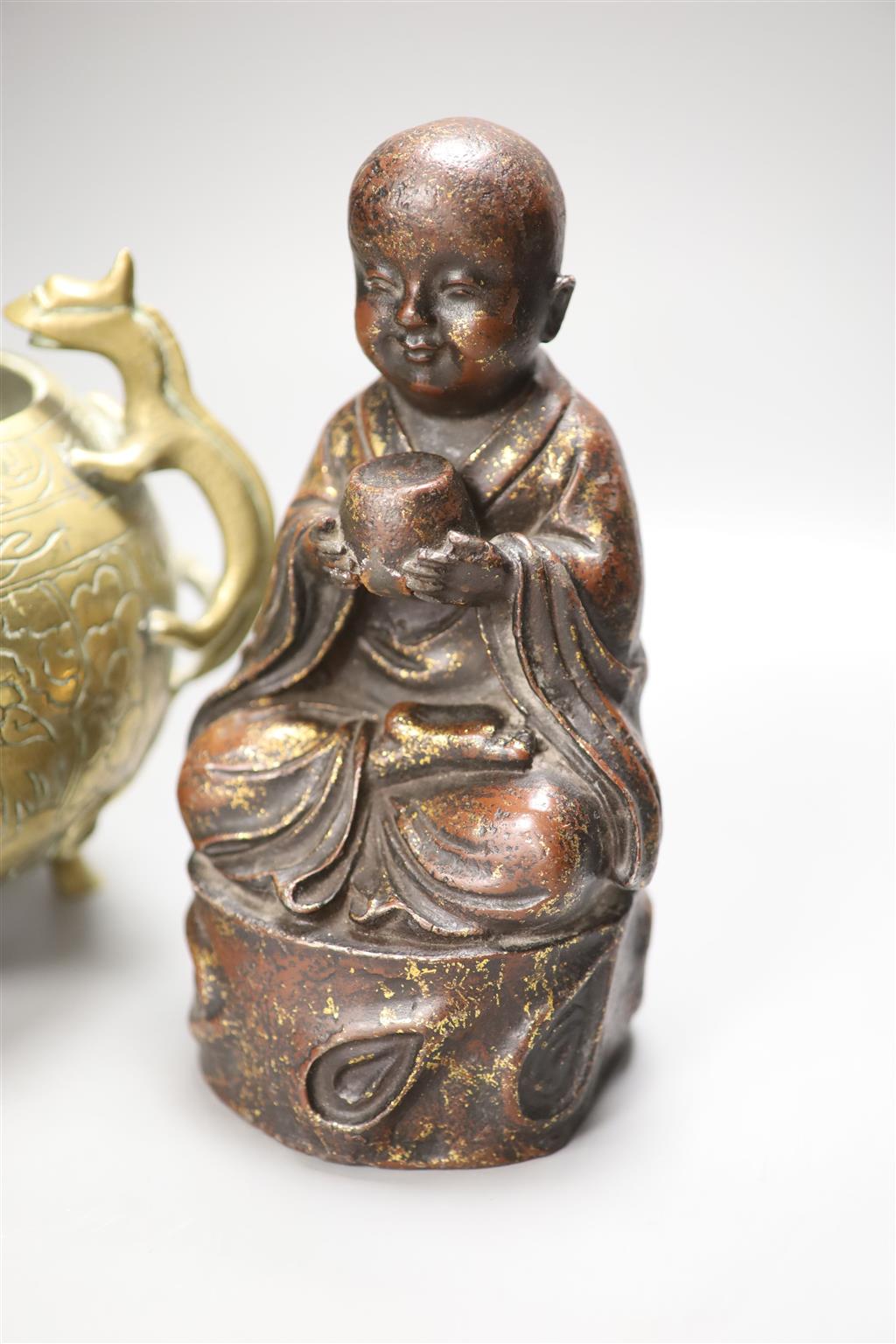 A 20th century Chinese cast metal buddha and a censer, tallest 22cm